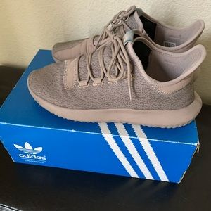 Tan Adidas tubulars